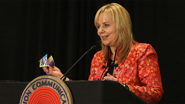 WACC General Secretary Rev. Dr. Karin Achtelstetter reveals a new origami game on communication rights to members of the Religion Communicators Council. (Foto: George Conklin)